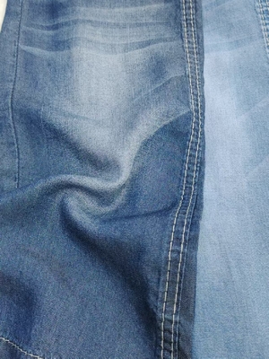 Купить 100% Tencel 4,5 унции Легкий вес Летние джинсы или футболки Джинсовая ткань Эластичный свободный 180 см Полная ширина online manufacture